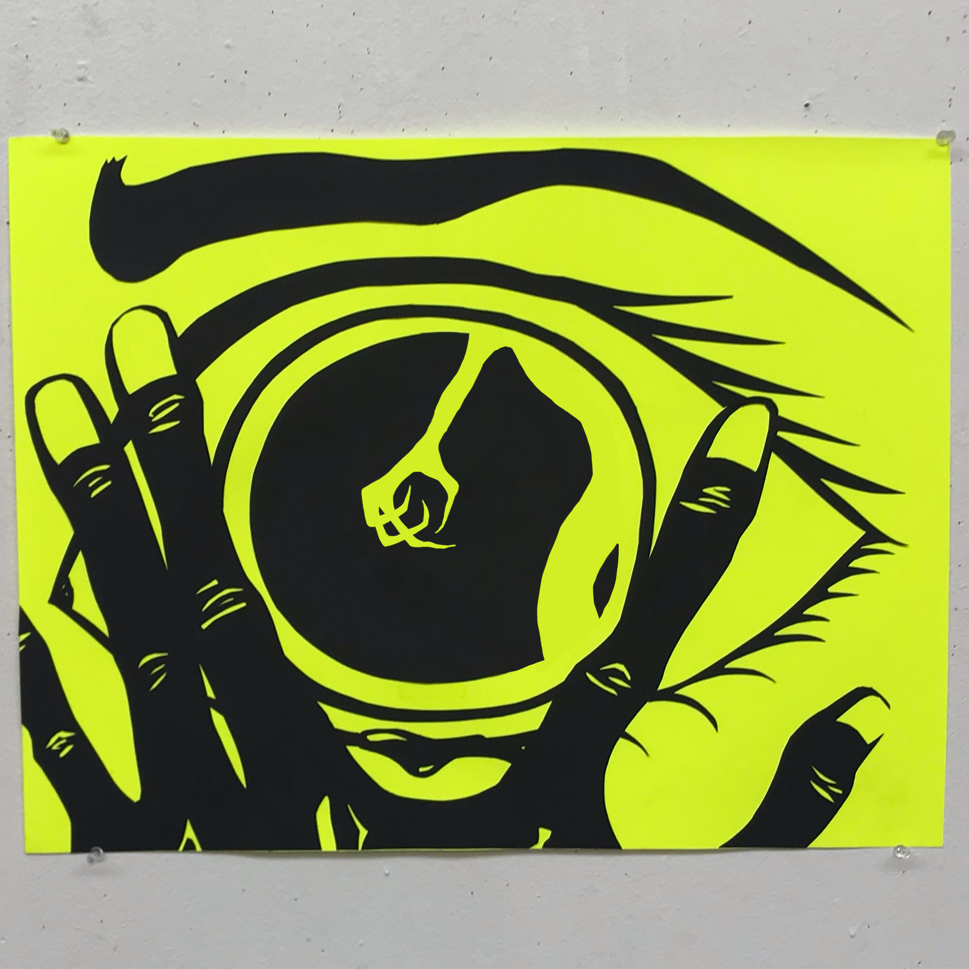 paper cutout graphic of a hand partially covering an eye with the reflection of a monster hand in the eye